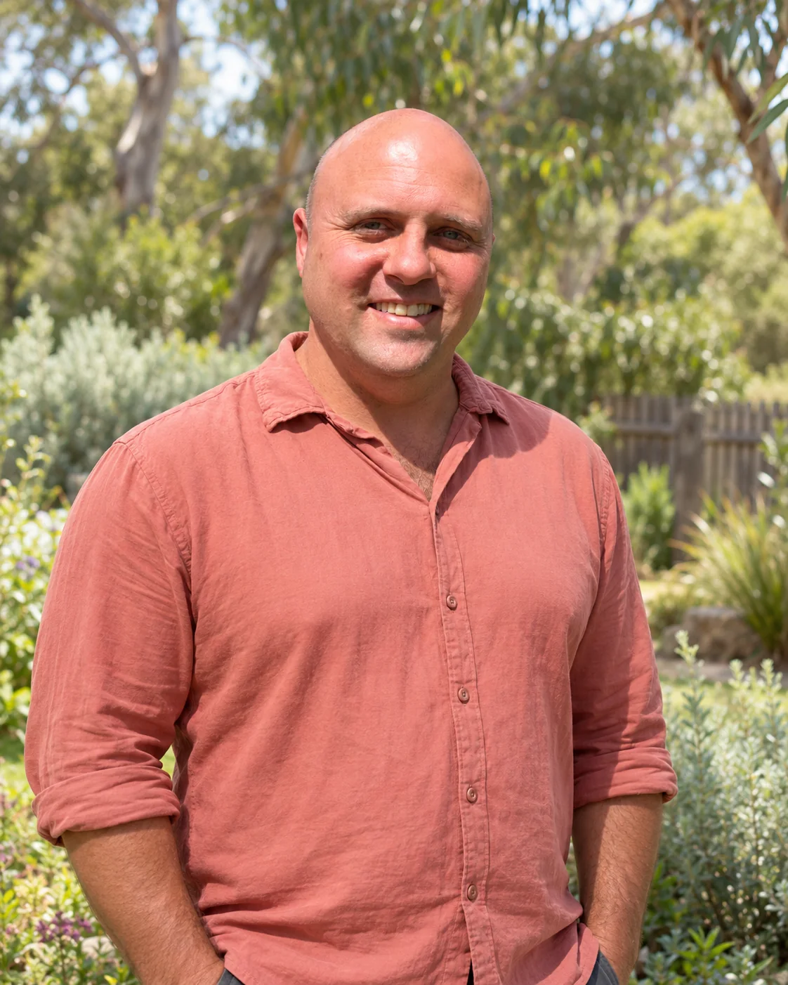 AI-assisted portrait of Alex Attard, smiling outdoors
